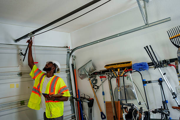 Professional Garage Door Panel Replacement technician working in Hamilton, IN